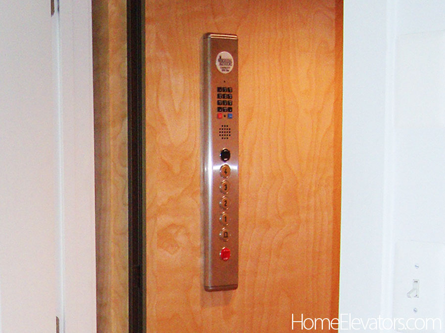 Phone built into the elevator control panel